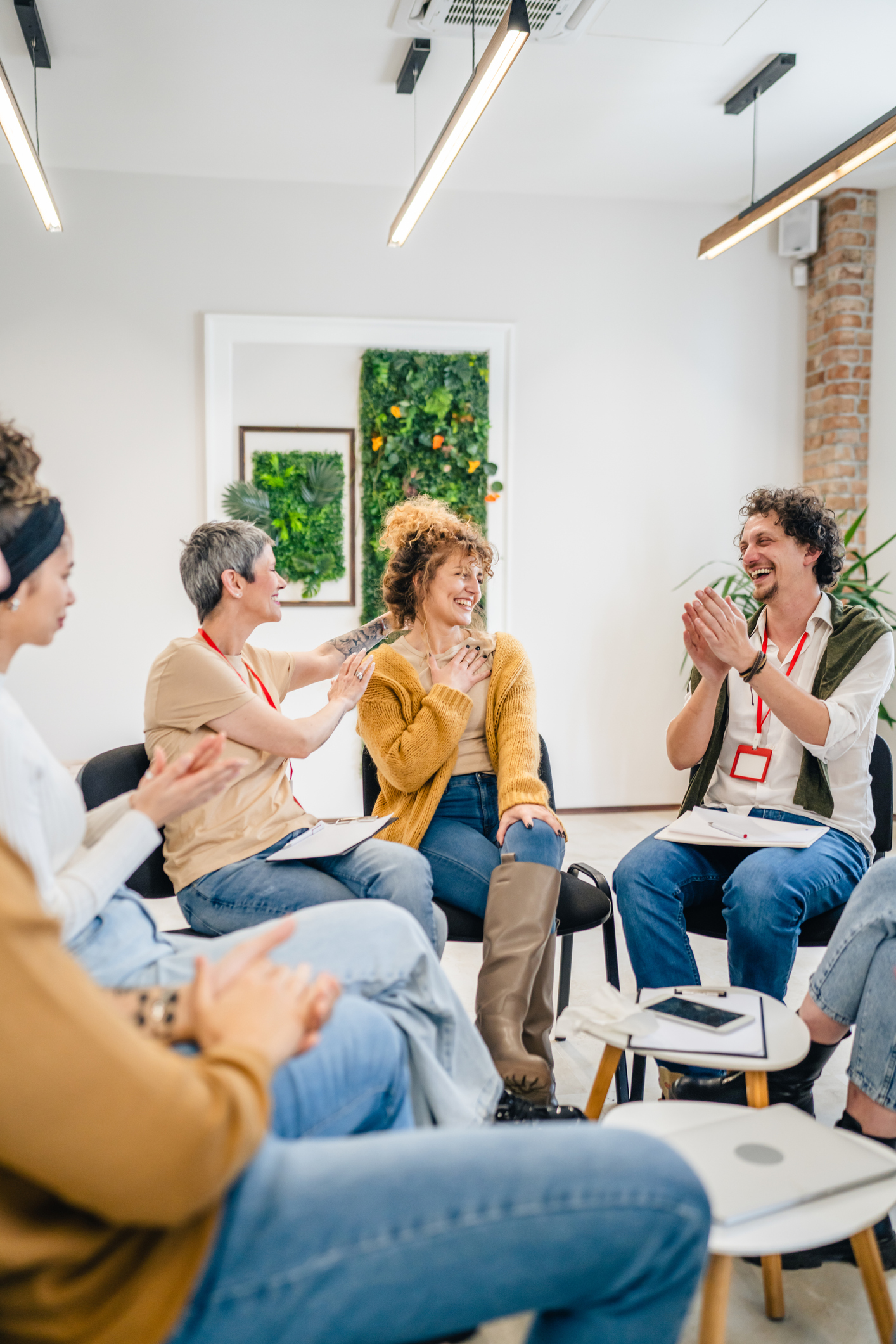 a circle of people in group therapy