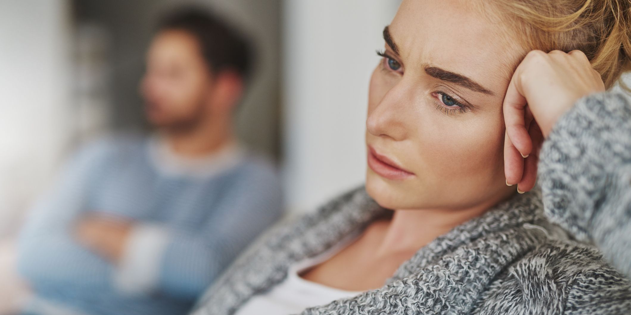 Cropped shot of an unhappy young couple after a fight at home