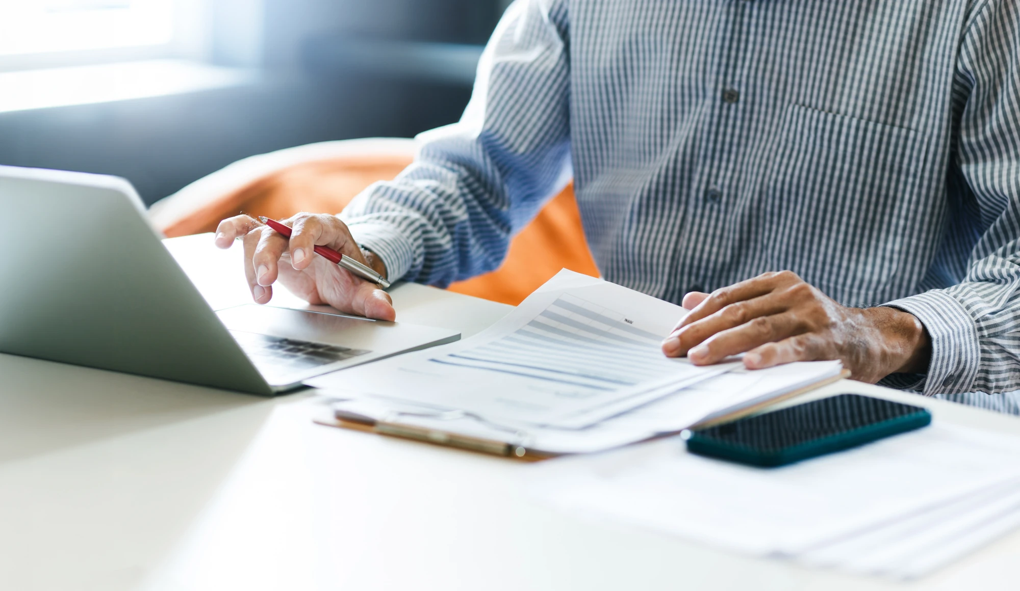 Lawyer working late with documents, showing the stress and burnout common in legal work.