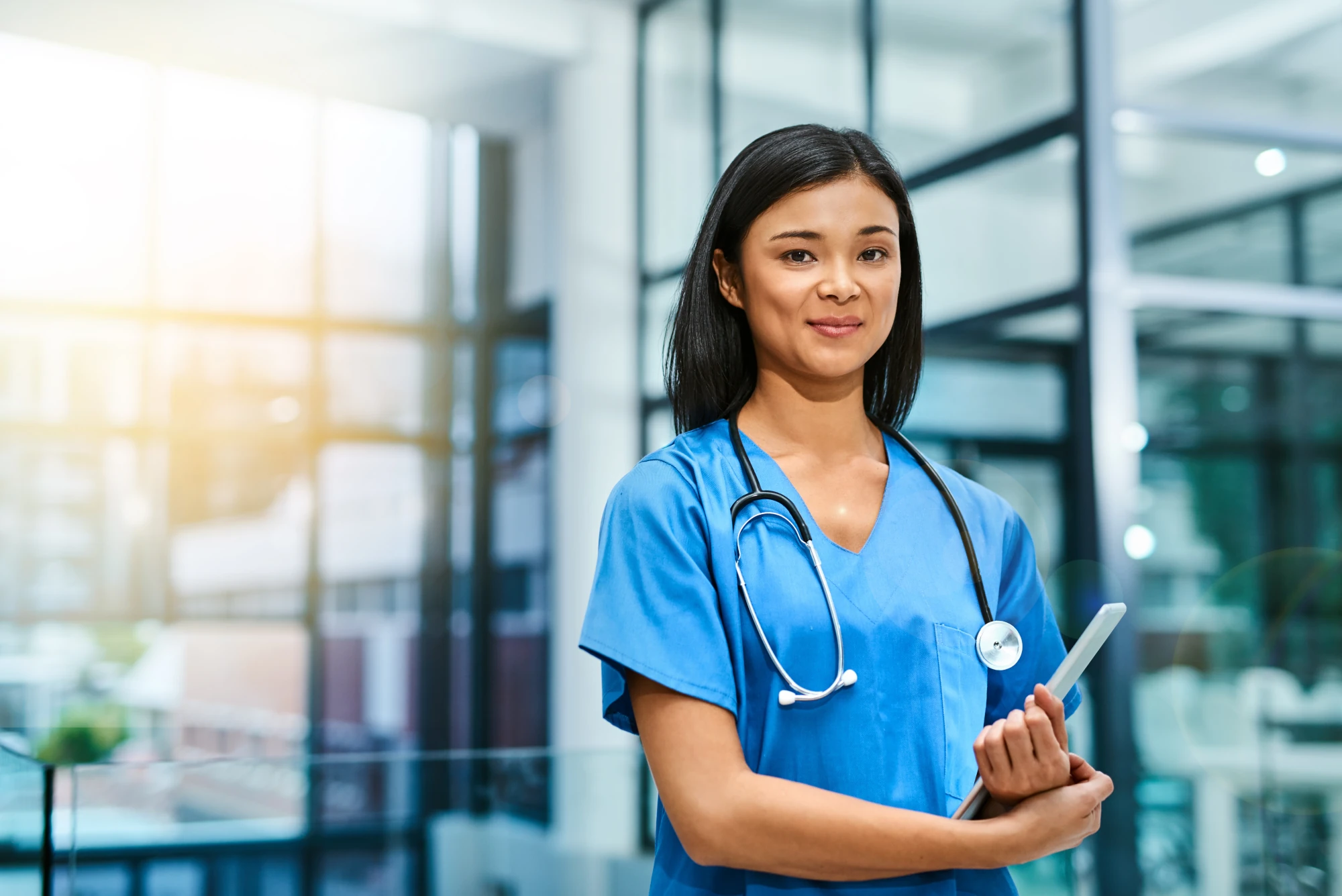 Healthcare worker arriving for a shift, representing a return to patient care after treatment.